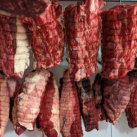 Beef joints hanging - topside and rolled rib