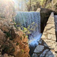 Stone bridge and waterfall of Palaiokarya, Greece