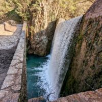 Stone bridge and waterfall of Palaiokarya, Greece